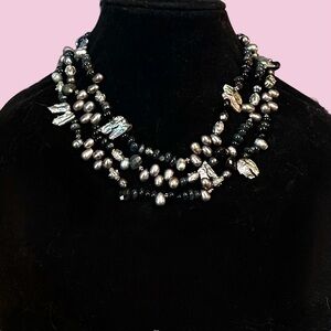 Julien triple strand peacock pearl and black bead necklace